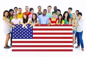 Large Group of People Holding American Flag Board